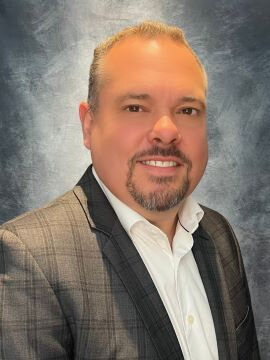 Portrait of Tone-Gar CEO Tony Atkins, leading the security services organization